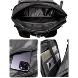 Mochila masculina de couro preto ELAVIER com punho reforçado