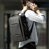 Vista lateral da mochila ELAVIER Slate com design expansível